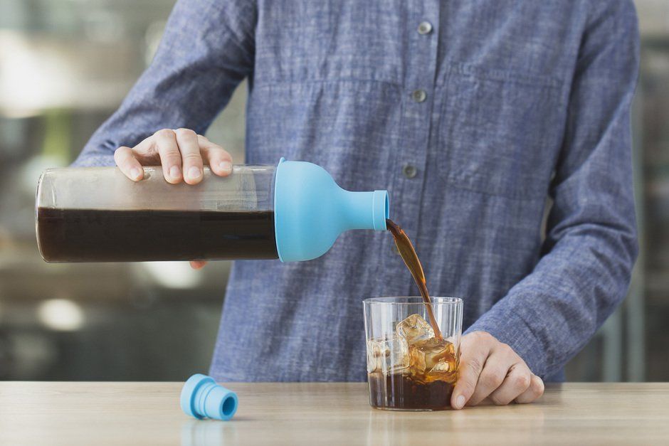 pouring coffee from a cold brew bottle