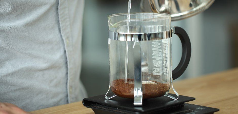 pouring hot water into a french press