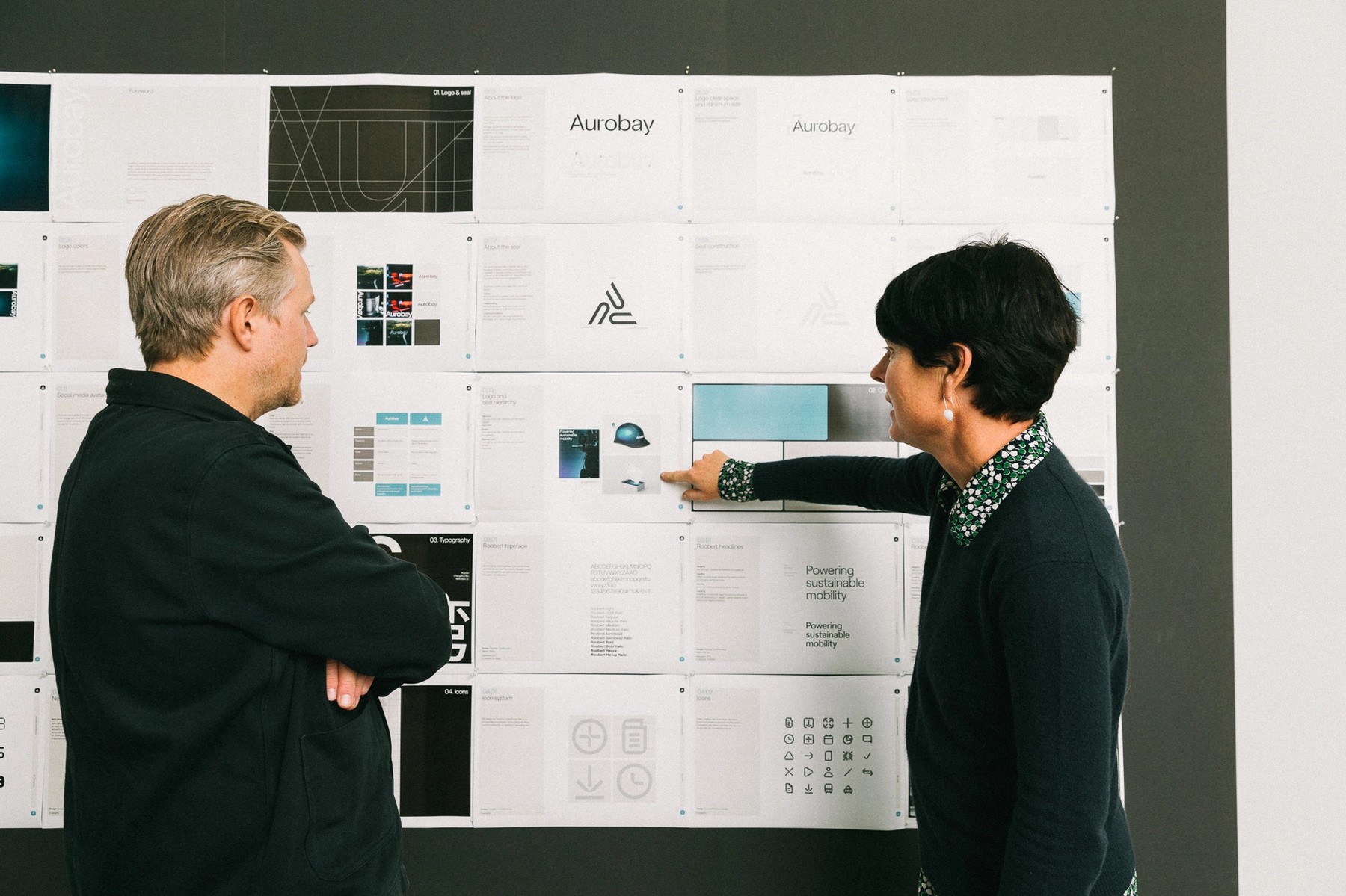 Designers discussing work