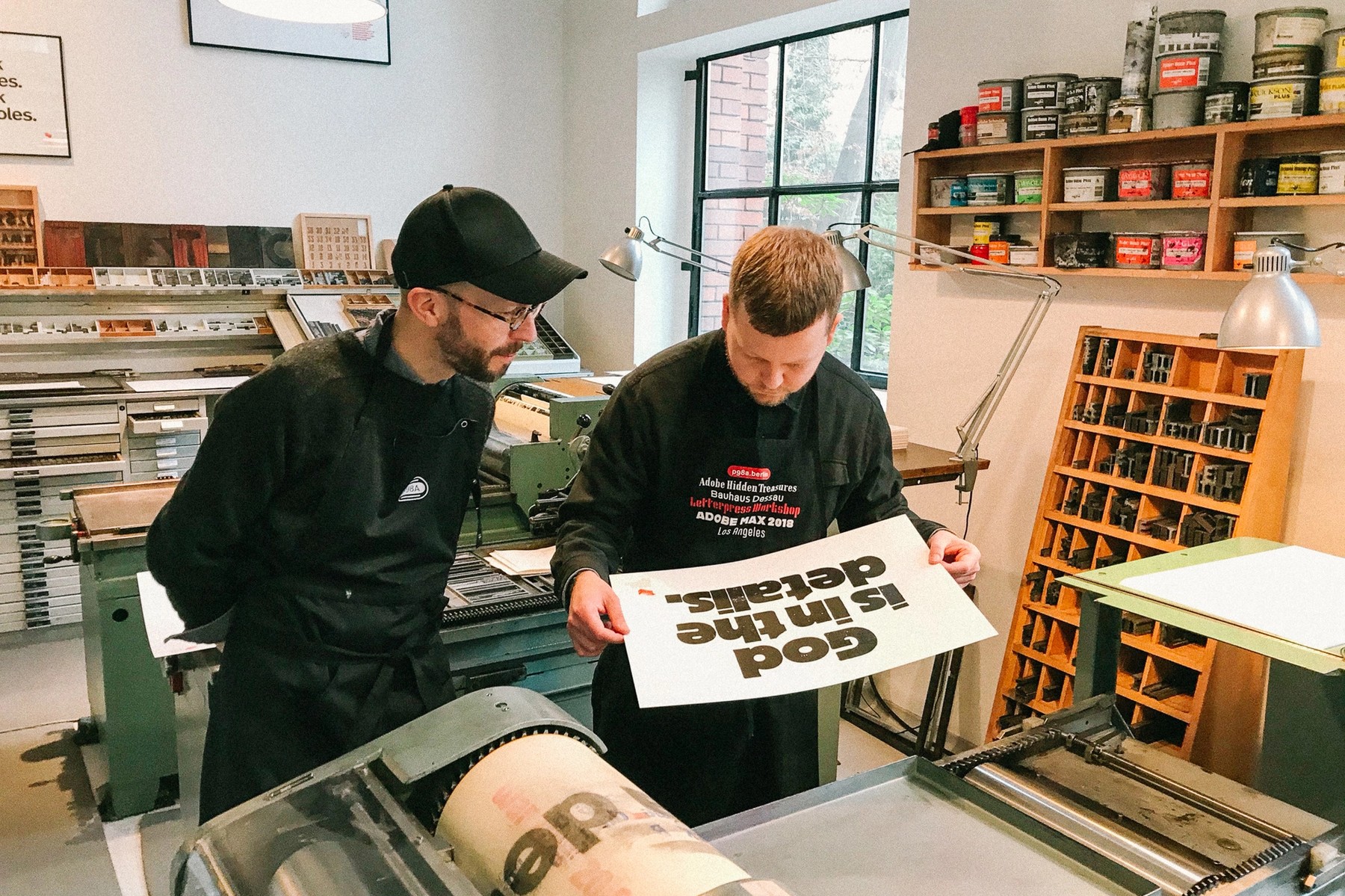Designers working in print shop