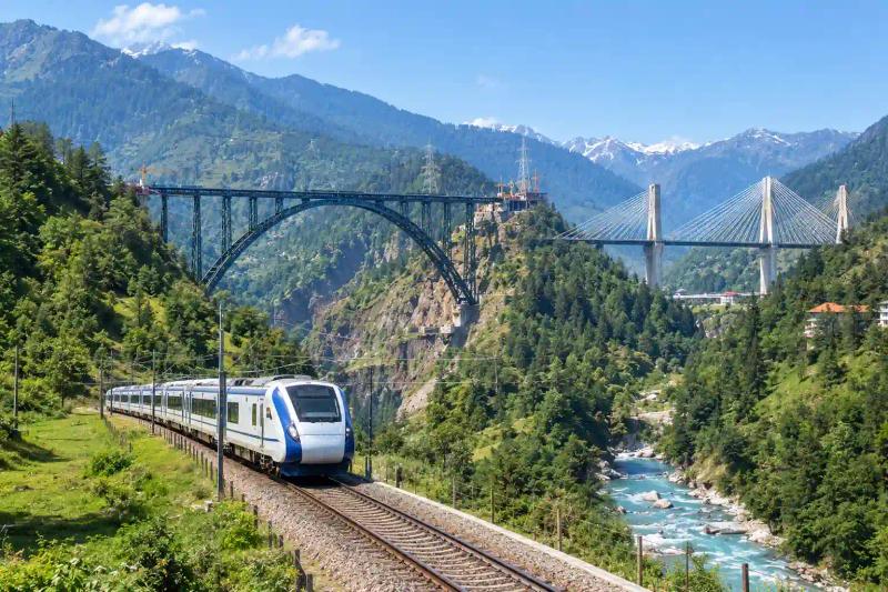 Kashmir by Train through the scenic mountains, lush valleys, bridges, and river landscapes of Kashmir.