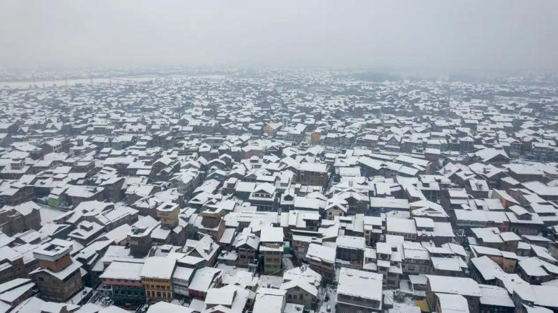 Snow-covered rooftops of Srinagar in winter ahead of Kashmir New Year