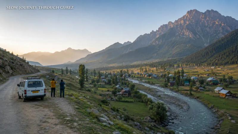 Things to Do in Kashmir – travellers enjoying a slow journey through Gurez Valley, overlooking the Kishanganga River, mountain villages and dramatic peaks.