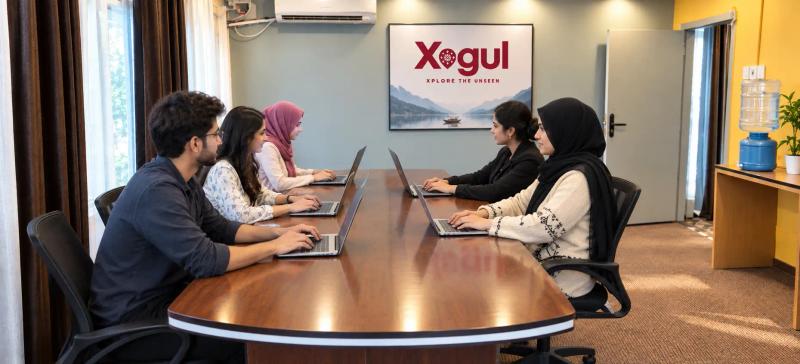 Xogul team in Srinagar planning Kashmir Winter Packages around a conference table