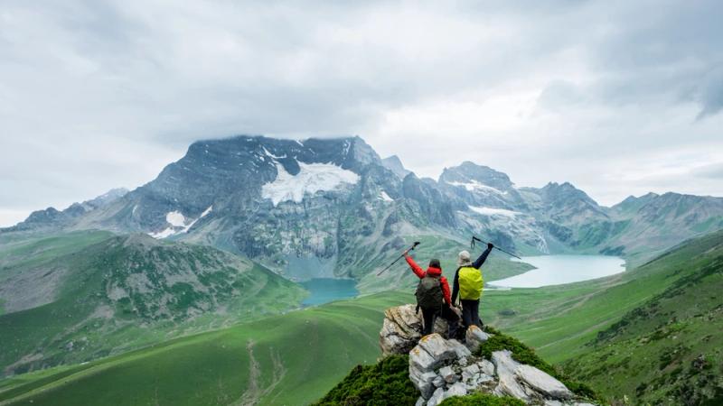 Couple enjoying Kashmir honeymoon package in Gulmarg snow and Pahalgam valleys