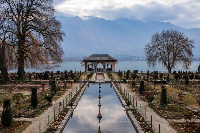 Mughal Gardens in Kashmir in November with quiet terraces, bare autumn trees and mountain views in Srinagar