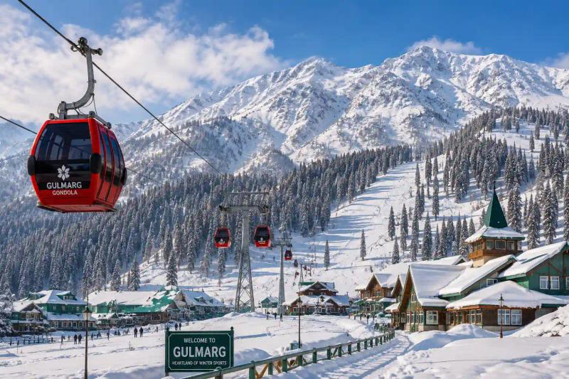 Gulmarg in November with early snowfall, snow-covered mountains and Gulmarg Gondola in Kashmir