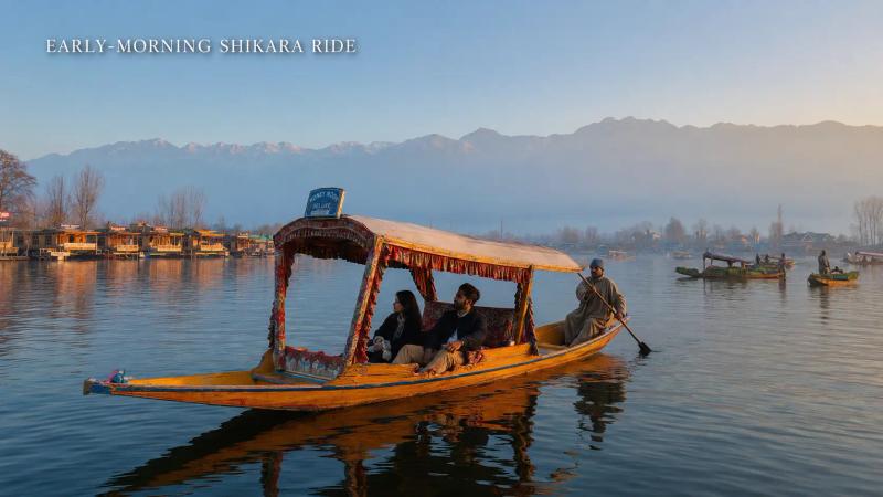 Things to Do in Kashmir – early-morning Shikara ride on Dal Lake with a local boatman, houseboats and mountain views.