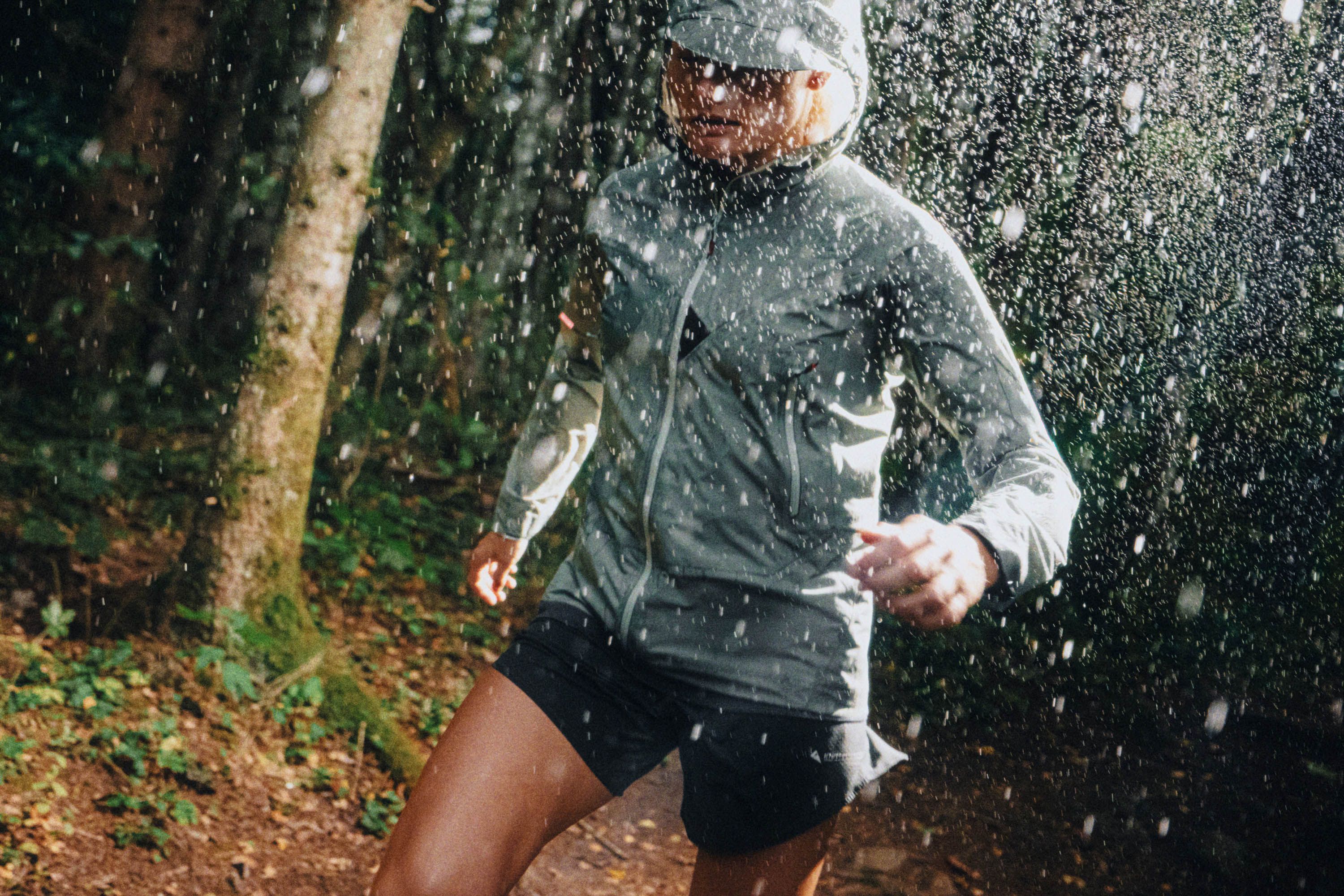 Woman running in the rain