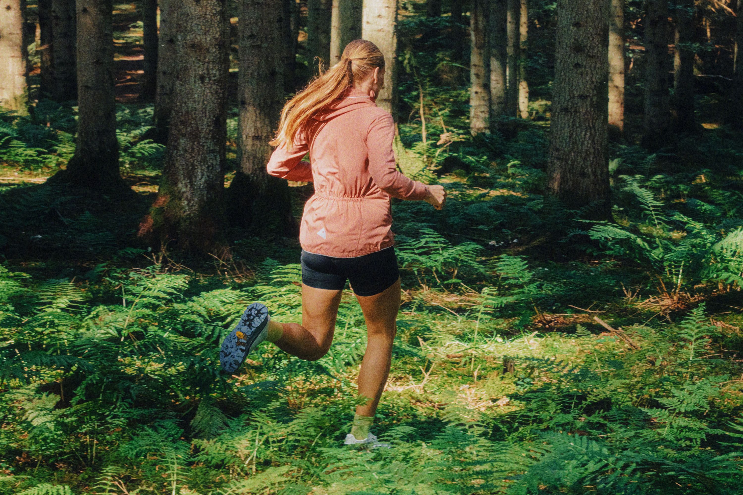 Woman running in the forrest