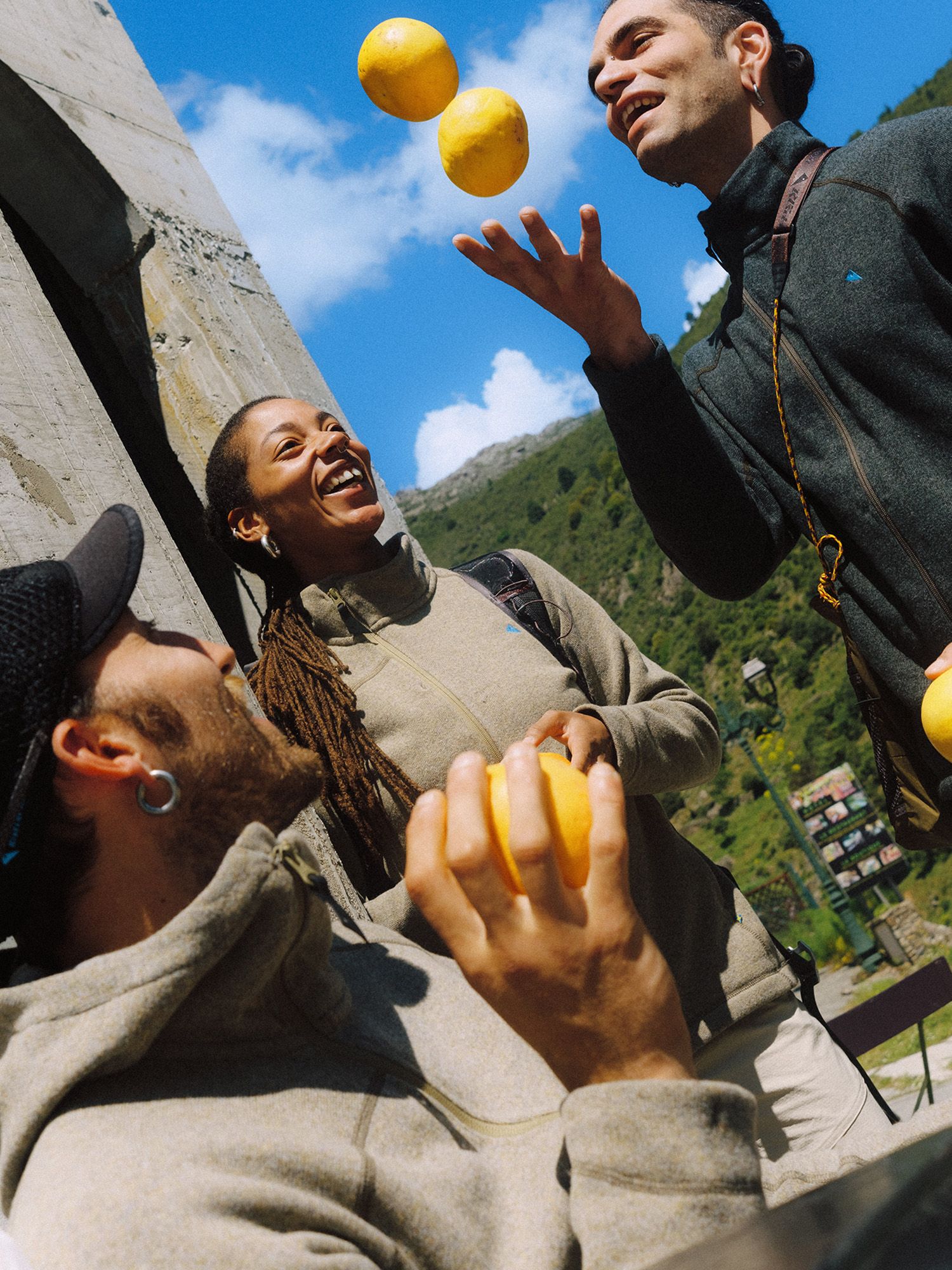 Man juggling oranges