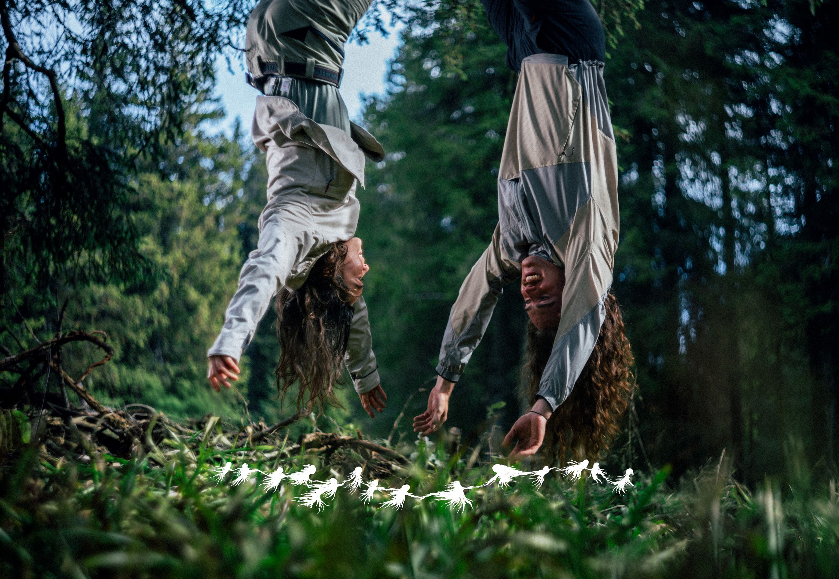 Man and woman hanging upside down