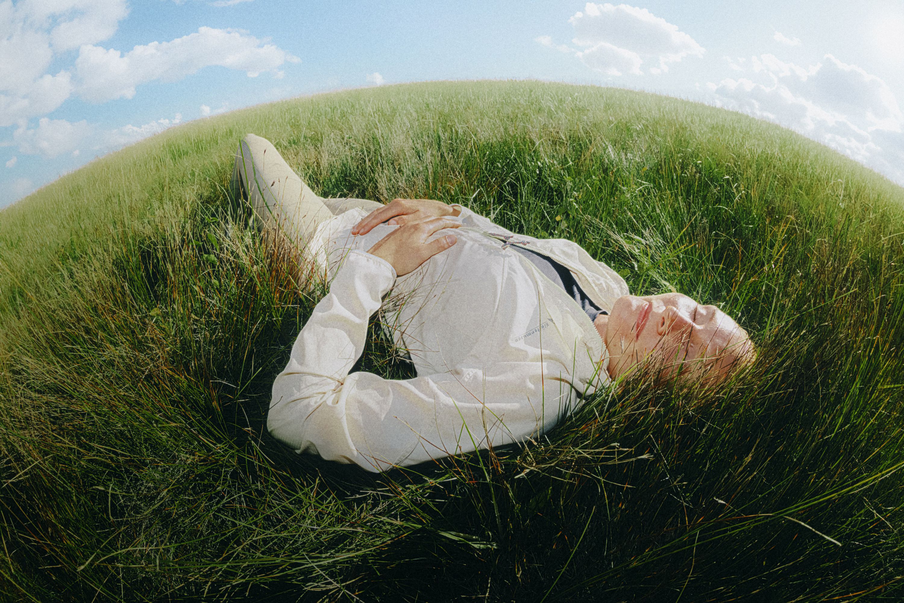 Woman lying in the grass