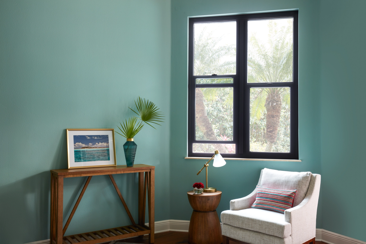 black vinyl window in a teal room