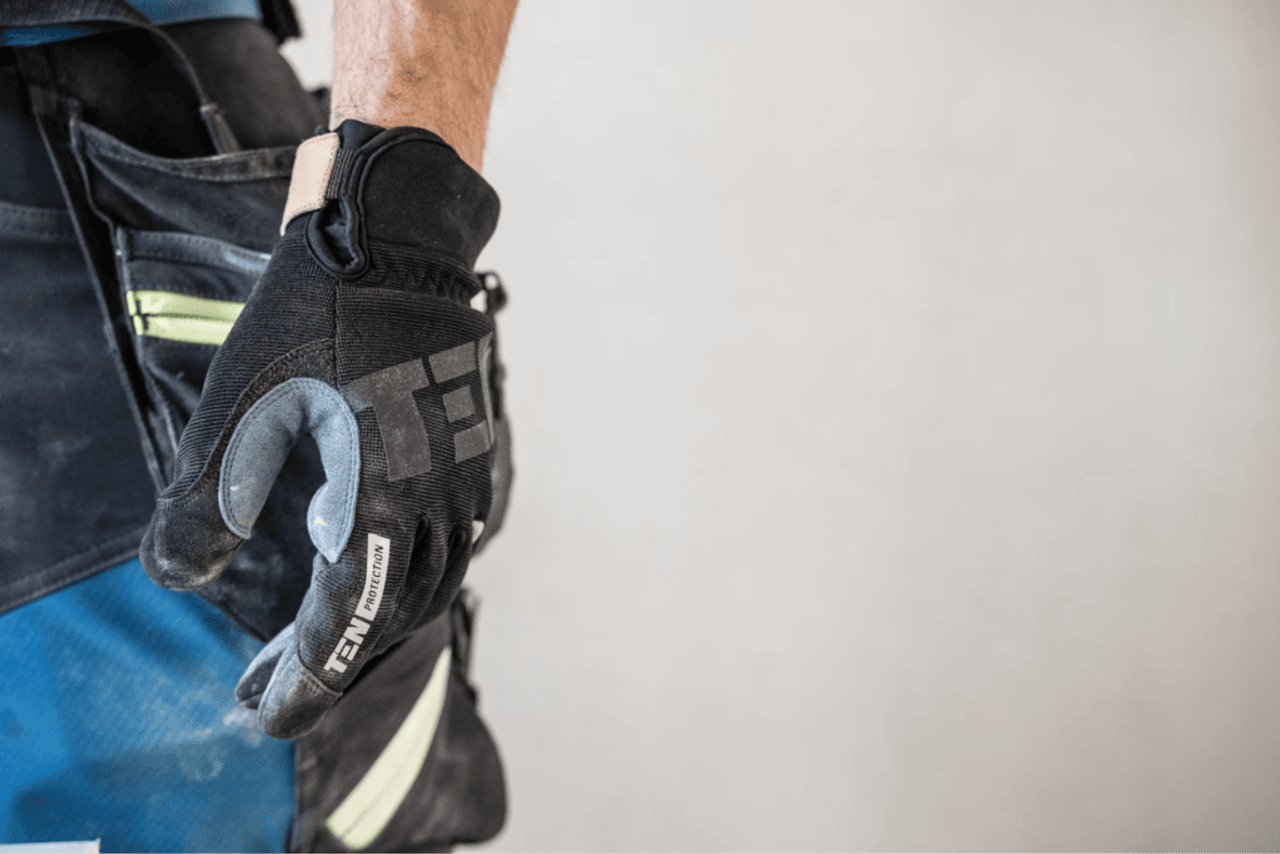 Contractor wearing work gloves