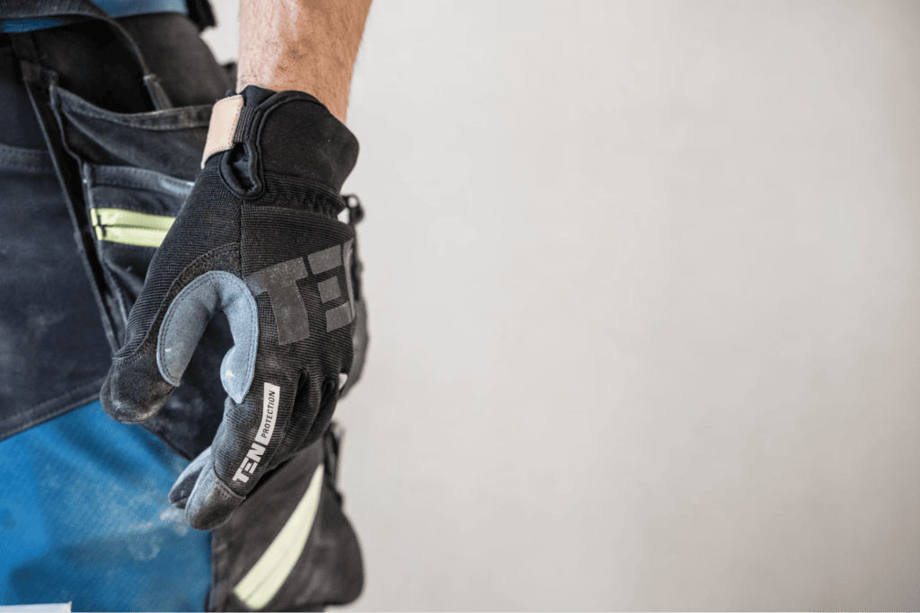 Contractor wearing work gloves