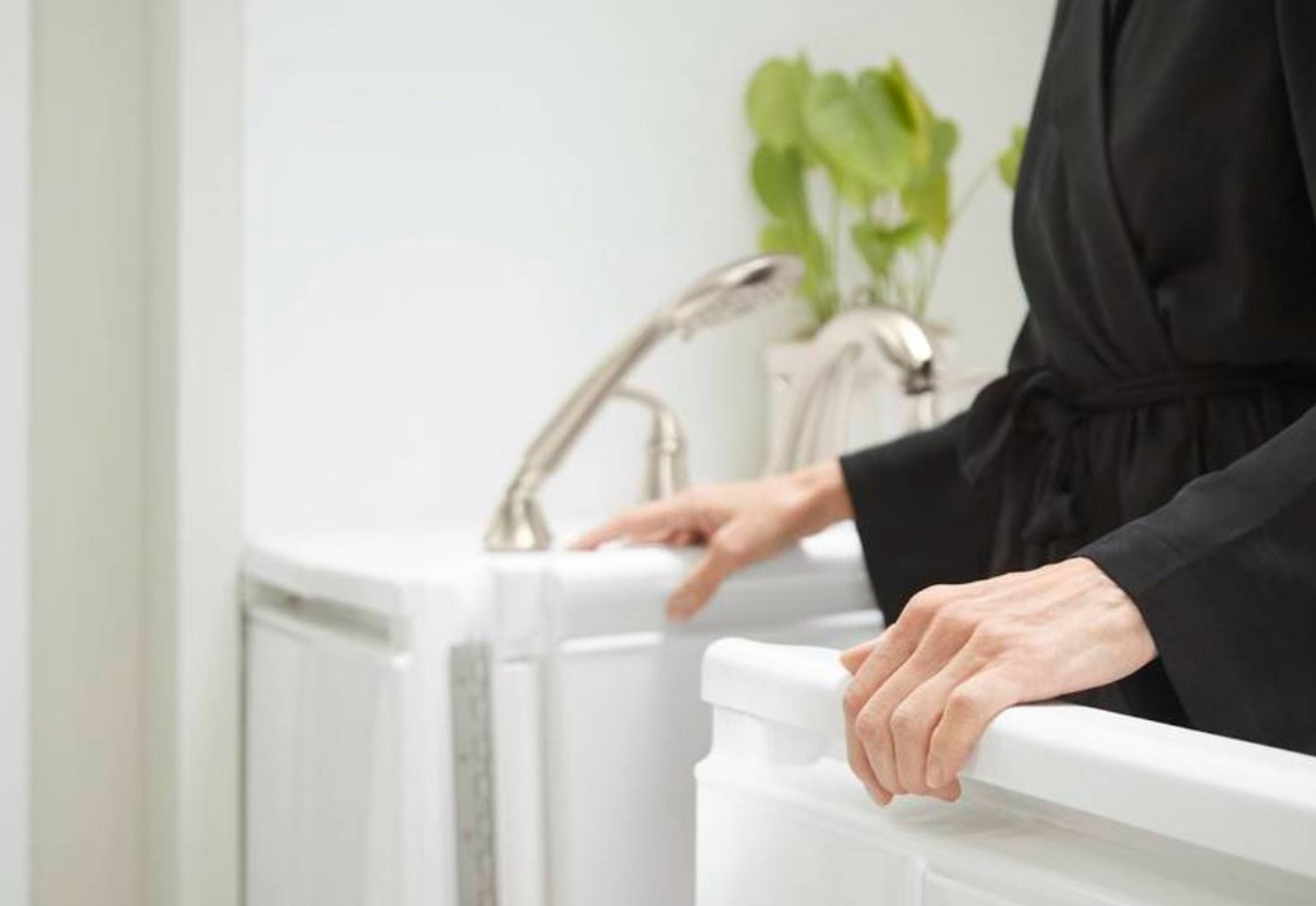 older adult exiting walk-in bath