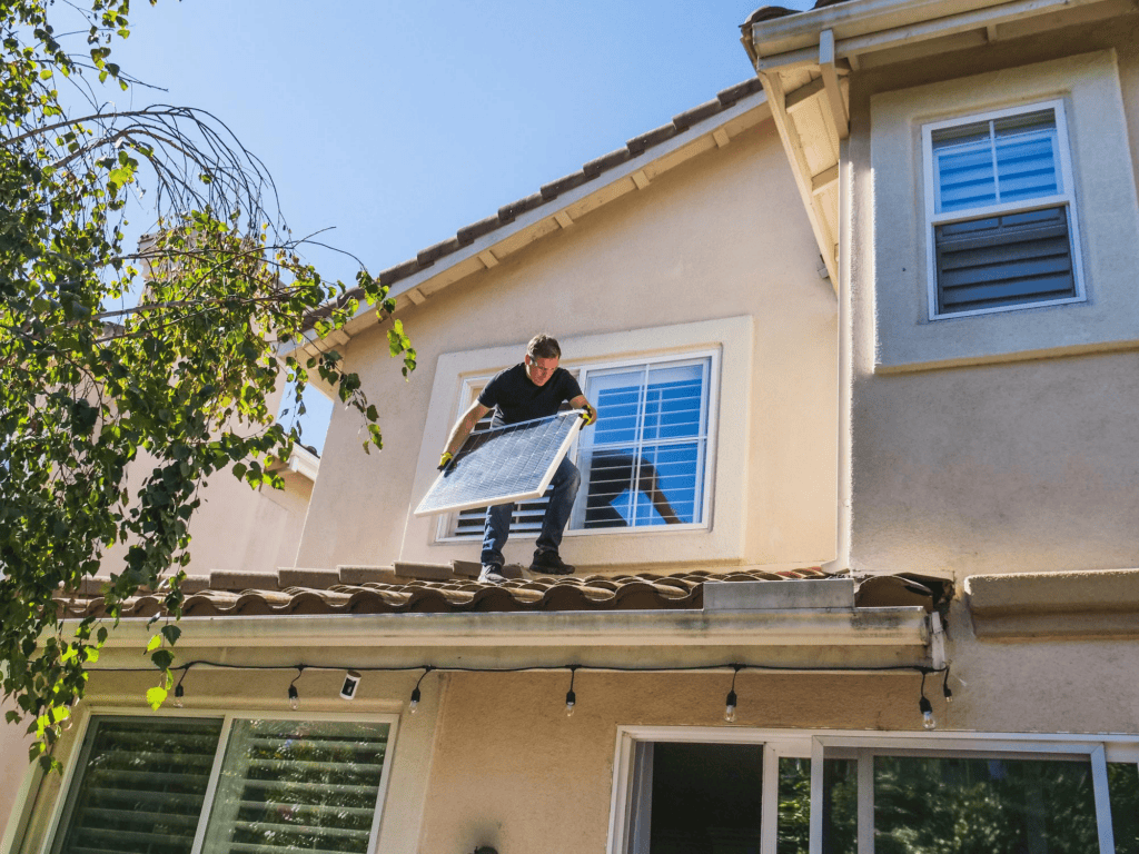 Renuity professional installing a window