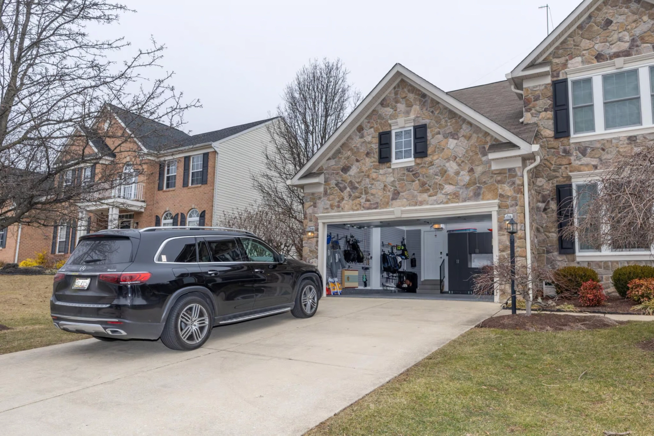 Charlotte home with garage open