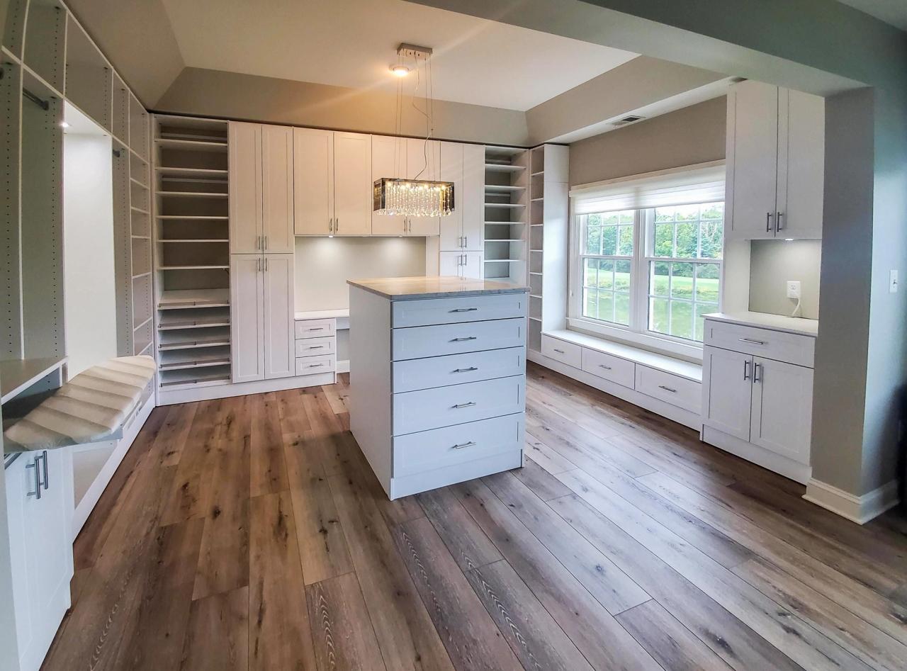 Large walk-in closet with an island