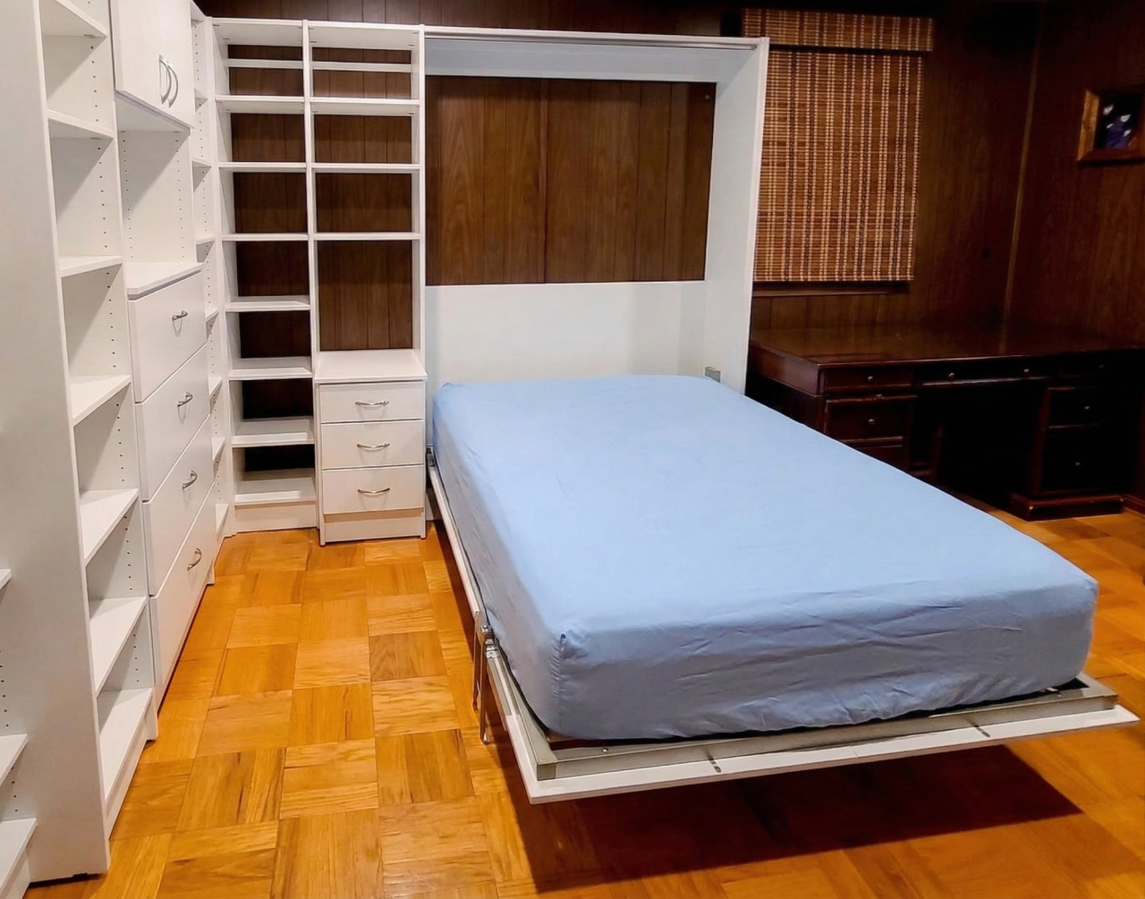 wallbed with blue sheets