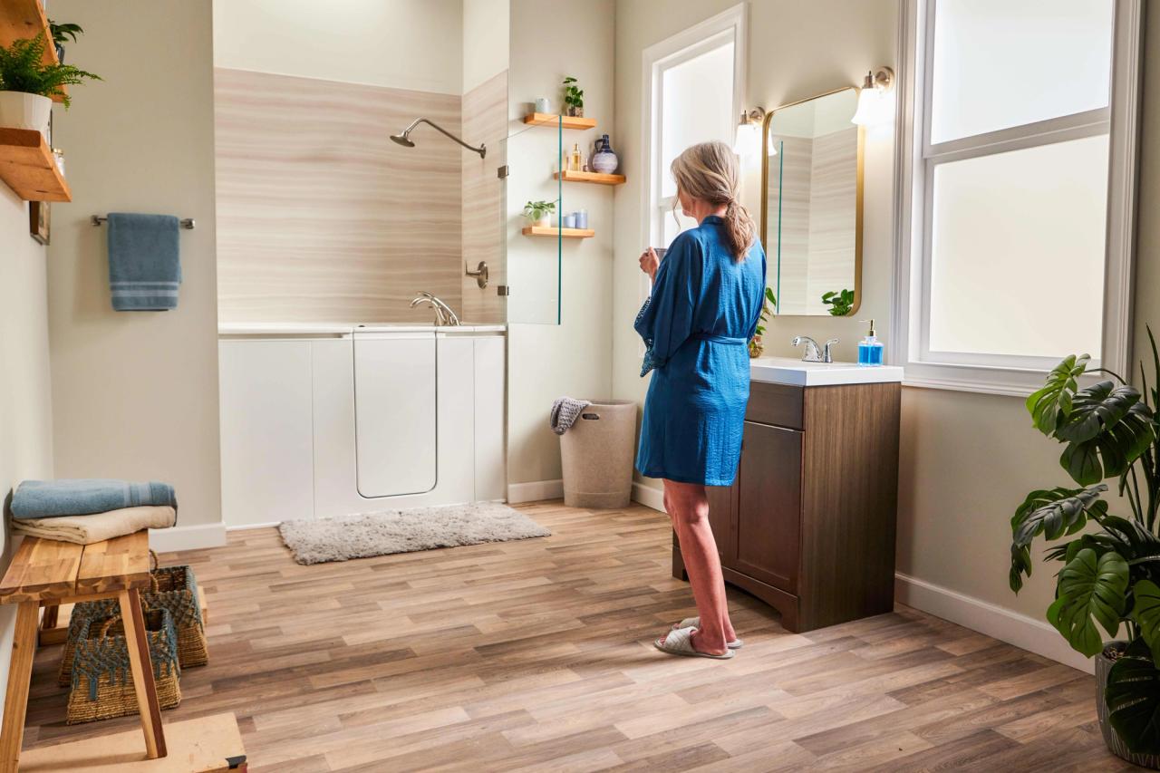 senior woman approaching her walk-in tub