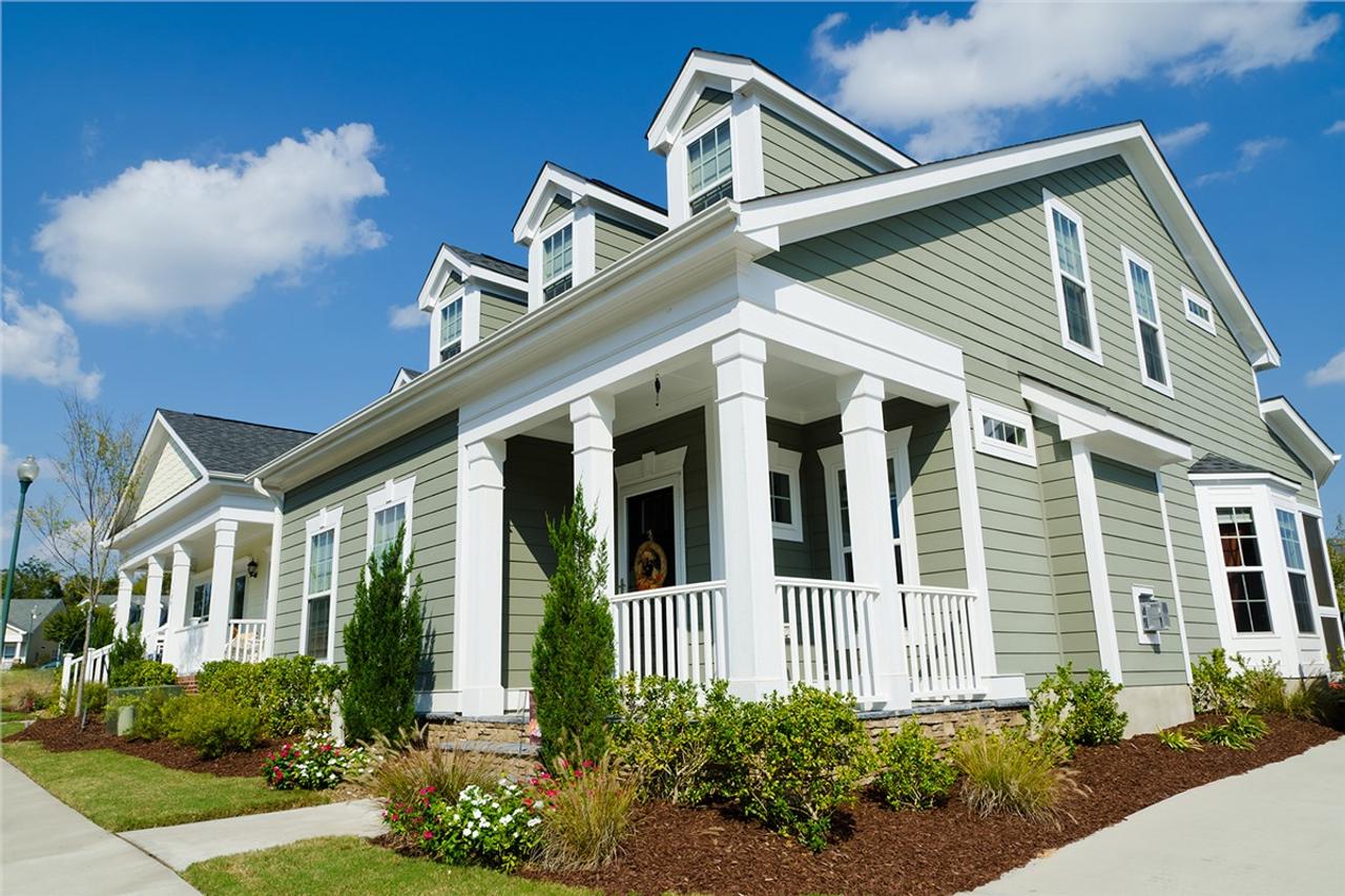 exterior of a home with white vinyl windows installed