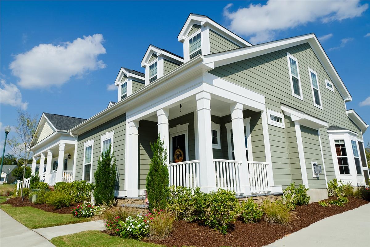 exterior of a home with white vinyl windows installed