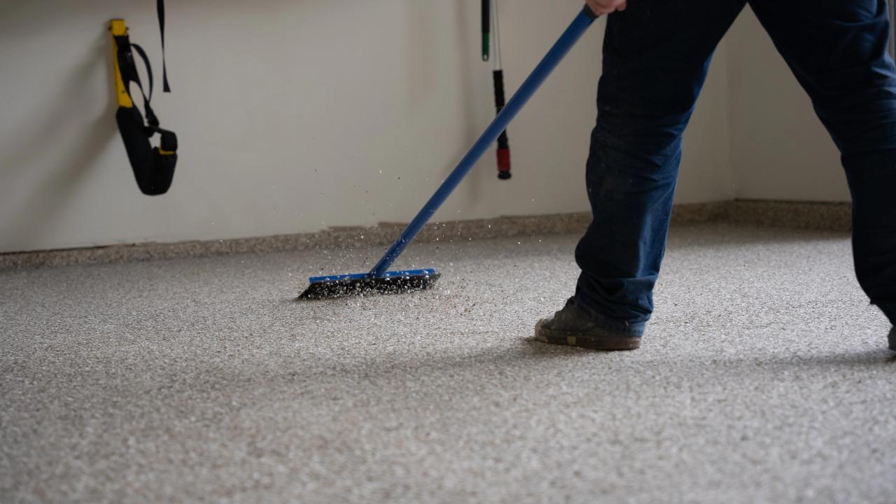 Renuity installer installing a polyurea floor coating