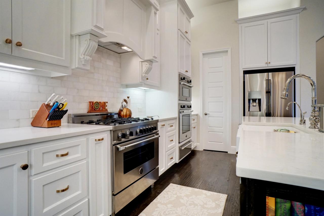 kitchen with white cupboards