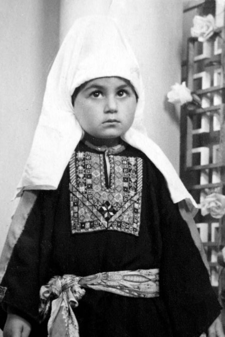 Young girl in the city of Bethlehem before the Nakba in 1948 in traditional Palestinian clothing