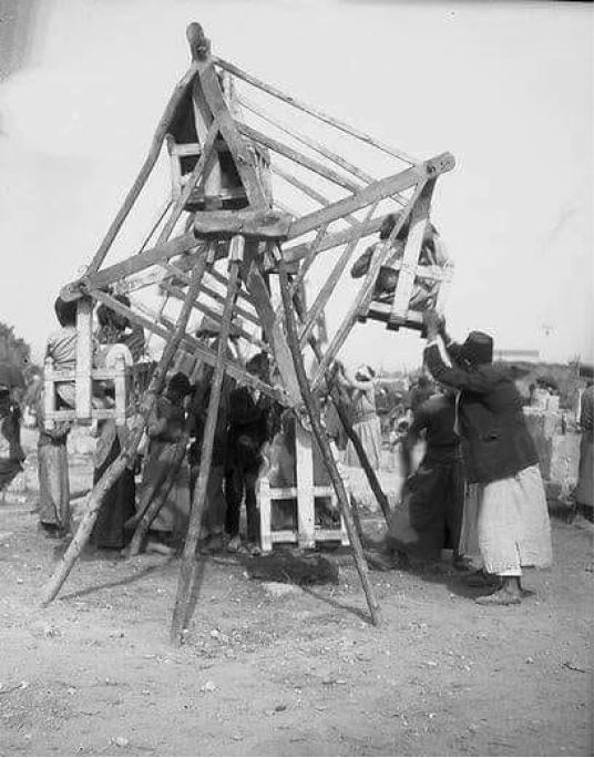 The swing of joy for the Palestinian holidays in 1930. Ramla.