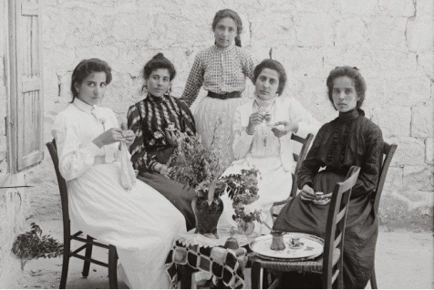 Palestinian women drink coffee. Early 1900s.