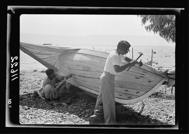 Loading drag net on boat and Tiberias fisheries. July 1940.