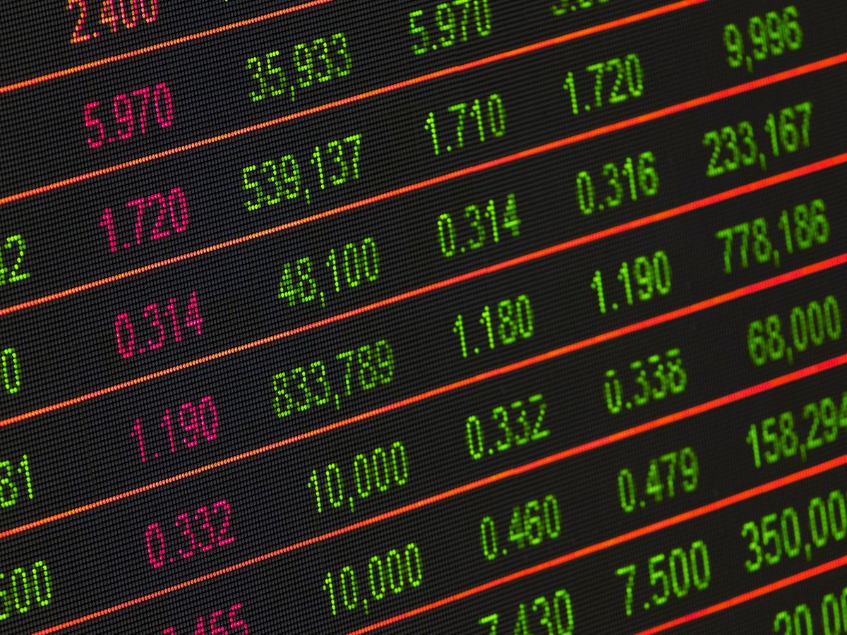 Detailed savings analysis dashboard on laptop screen