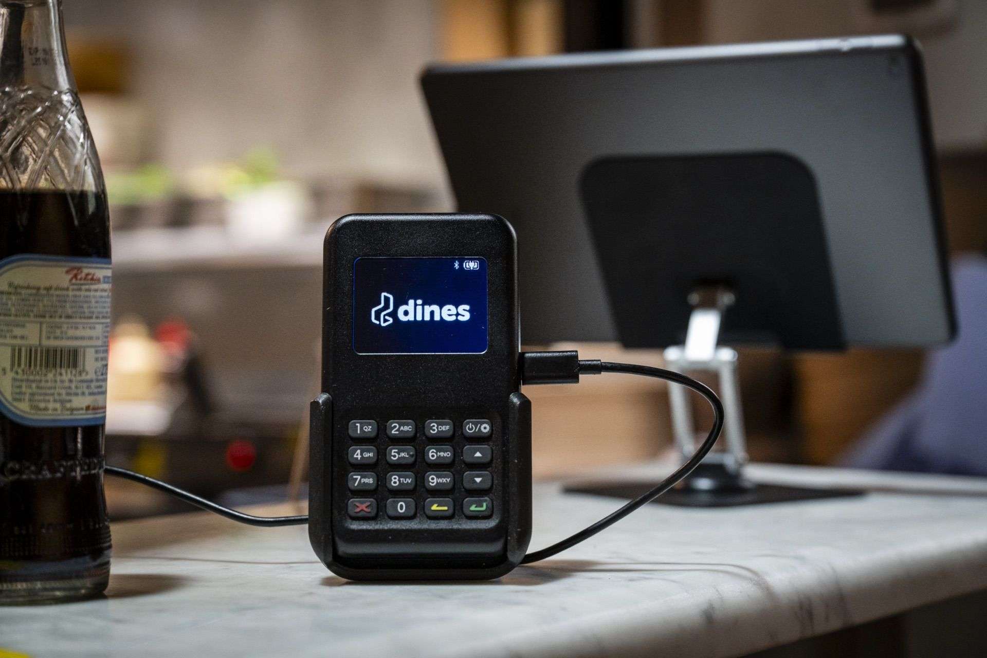 Dines payment terminal with blue screen at food hall