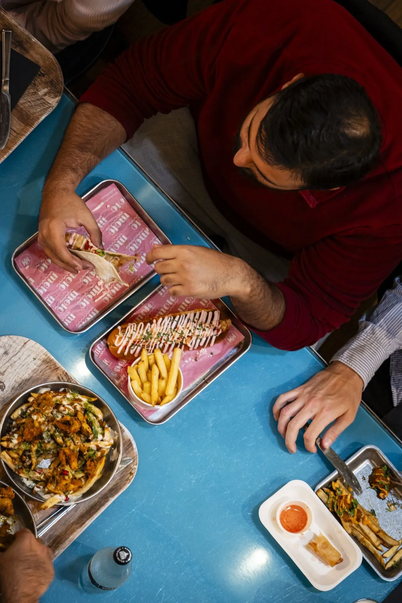 Food hall vendors under brick arches