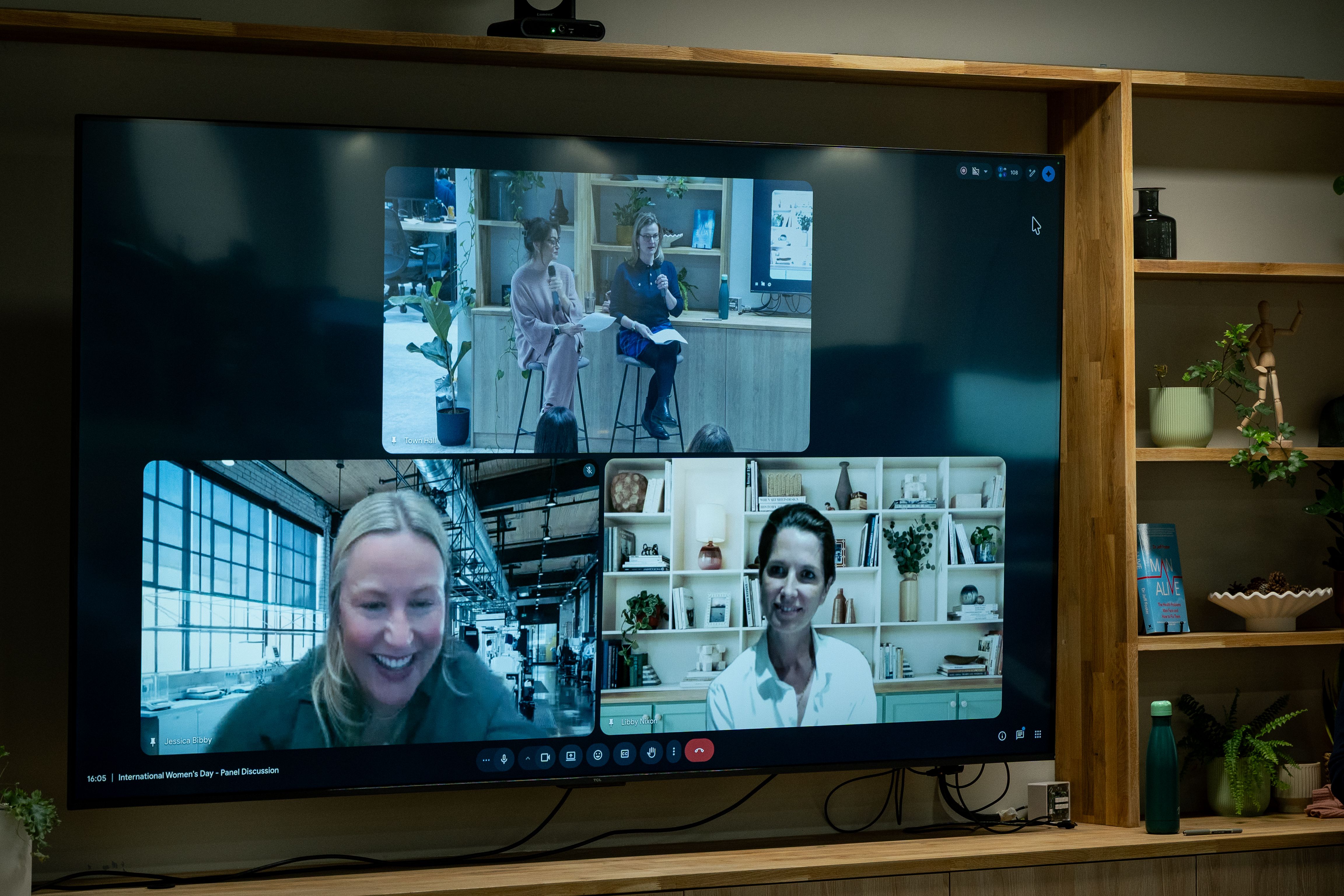 An image of a screen with 4 speakers