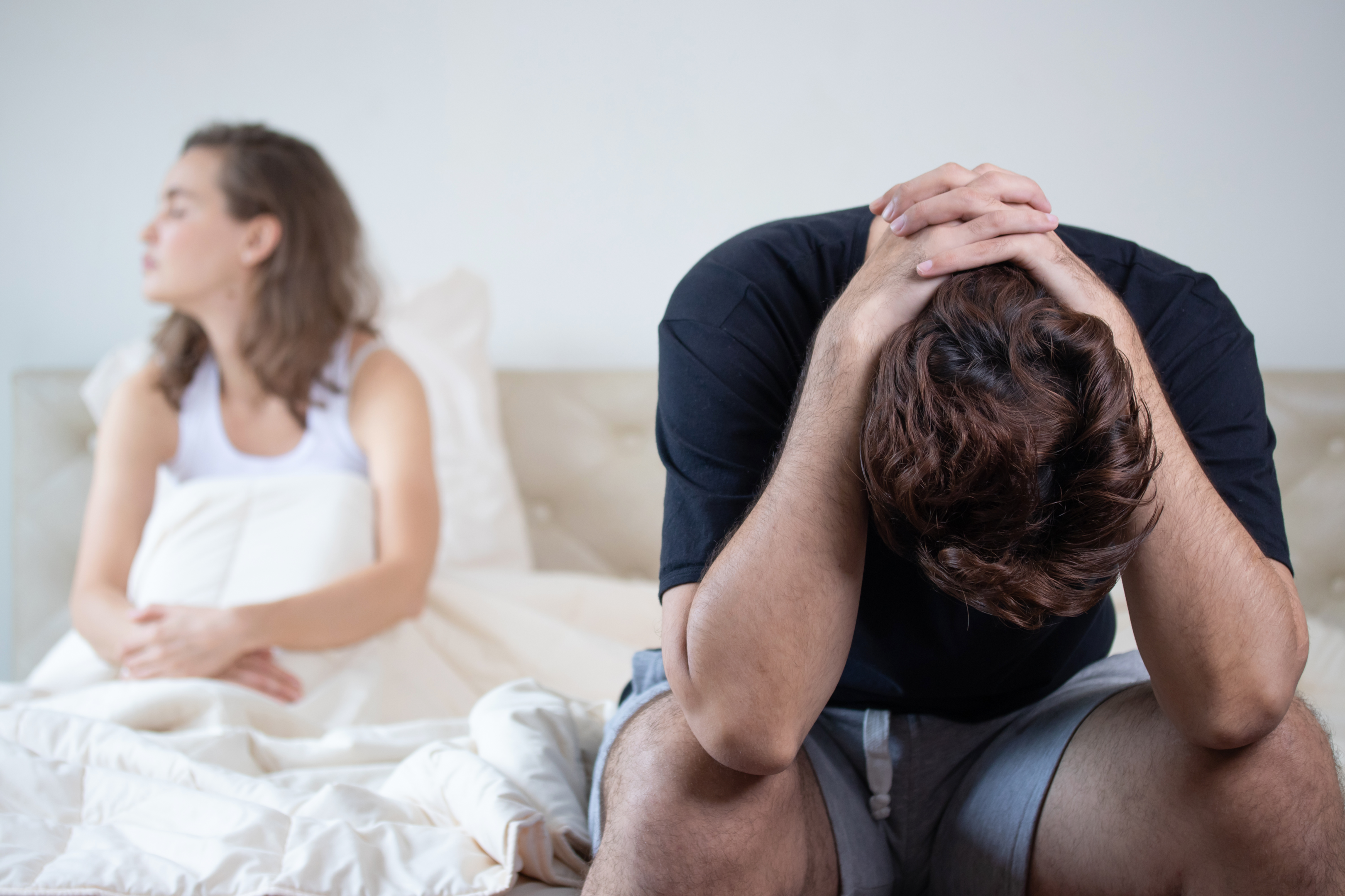 man hands behind his head