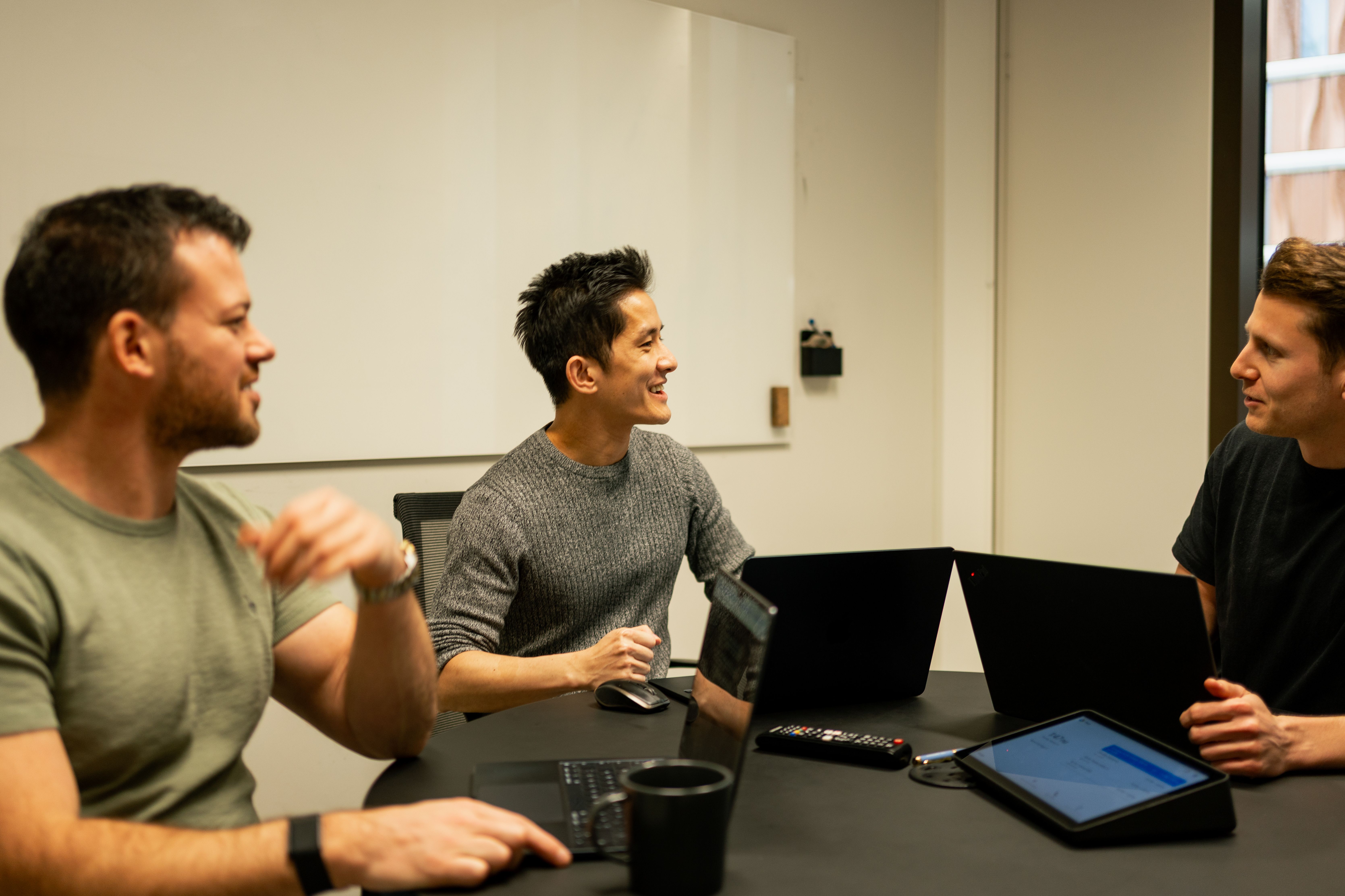Voy employees in a meeting