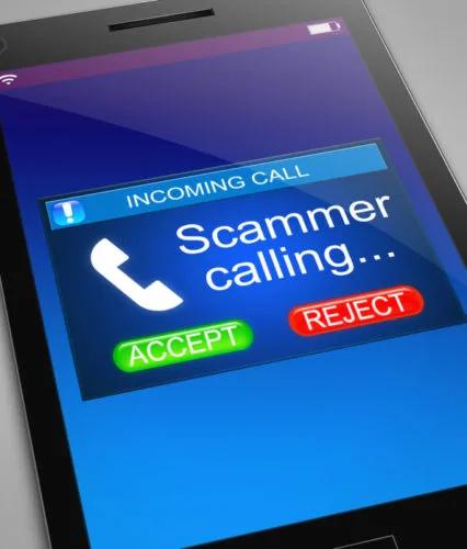 Smartphone screen showing an incoming call labeled "Scammer calling" with accept and reject buttons