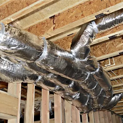 Insulated flexible ductwork running through an unfinished attic