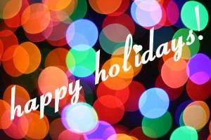 "Happy holidays!" written over colorful bokeh lights