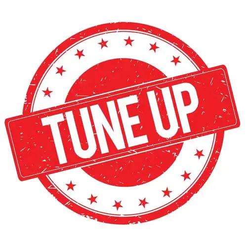 Red rubber-stamp graphic reading "Tune Up"
