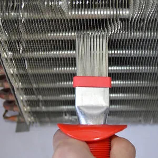 Fin comb straightening the bent metal fins of an air conditioner coil