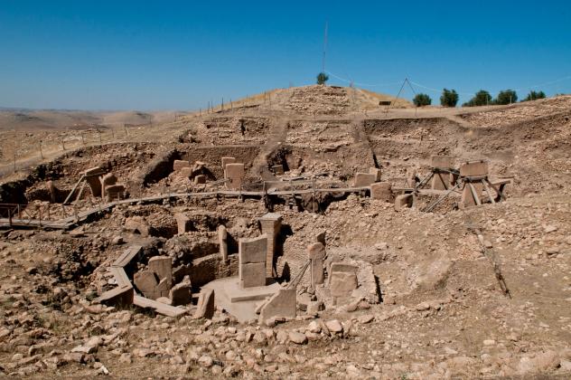 Excavated circular enclosures with T-shaped megalithic stone pillars at Göbekli Tepe, near Şanlıurfa, before the modern protective canopy was built.