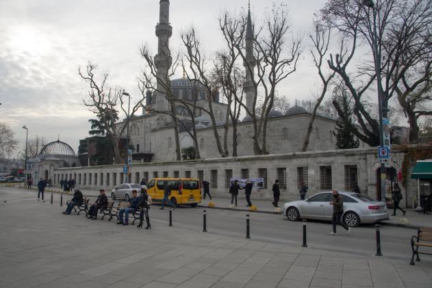 Yeni Valide Mosque in Üsküdar, a multi-domed imperial mosque with two minarets, seen across a public square.
