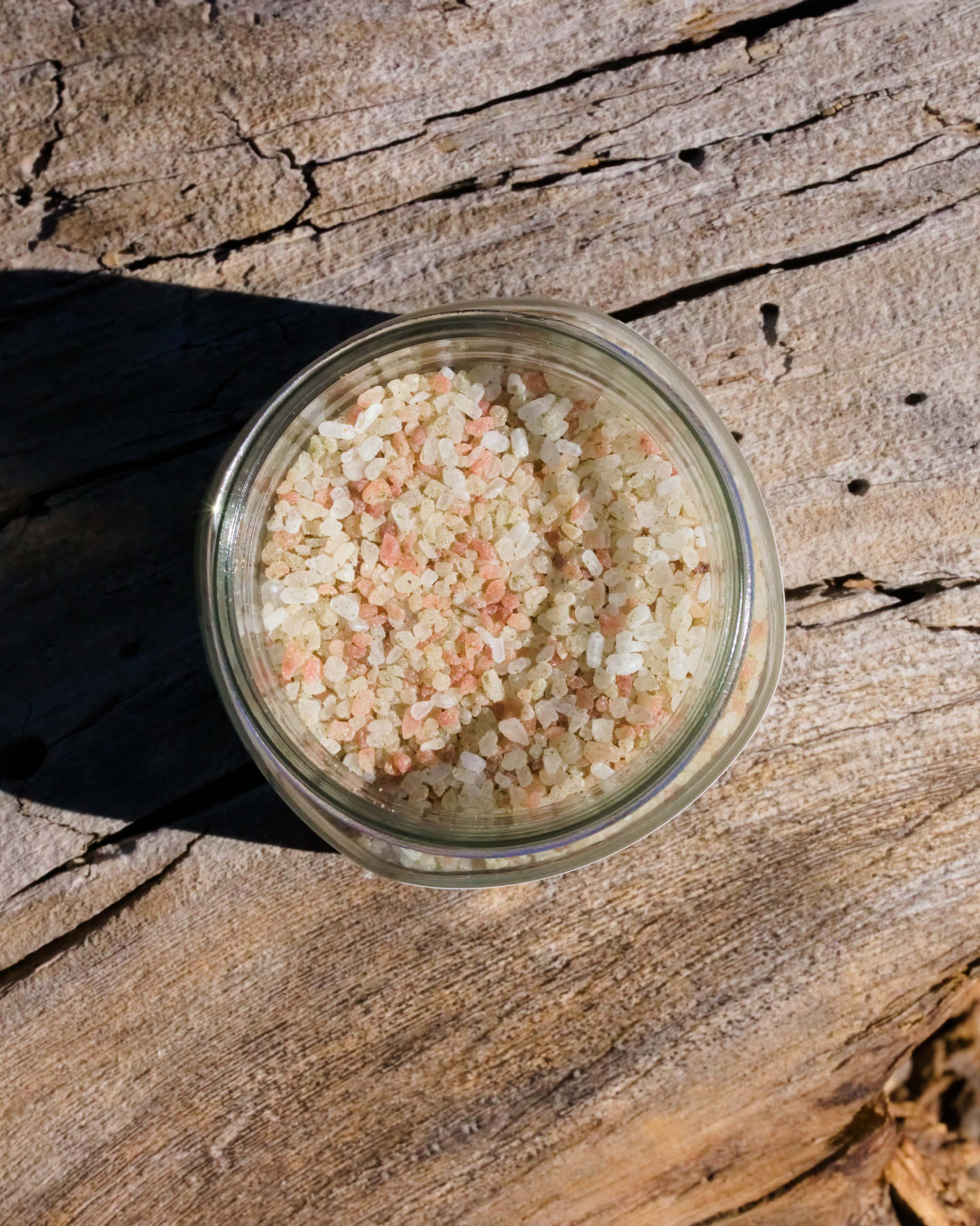 Voices Of Spring Botanical Soak surrounded by ingredients
