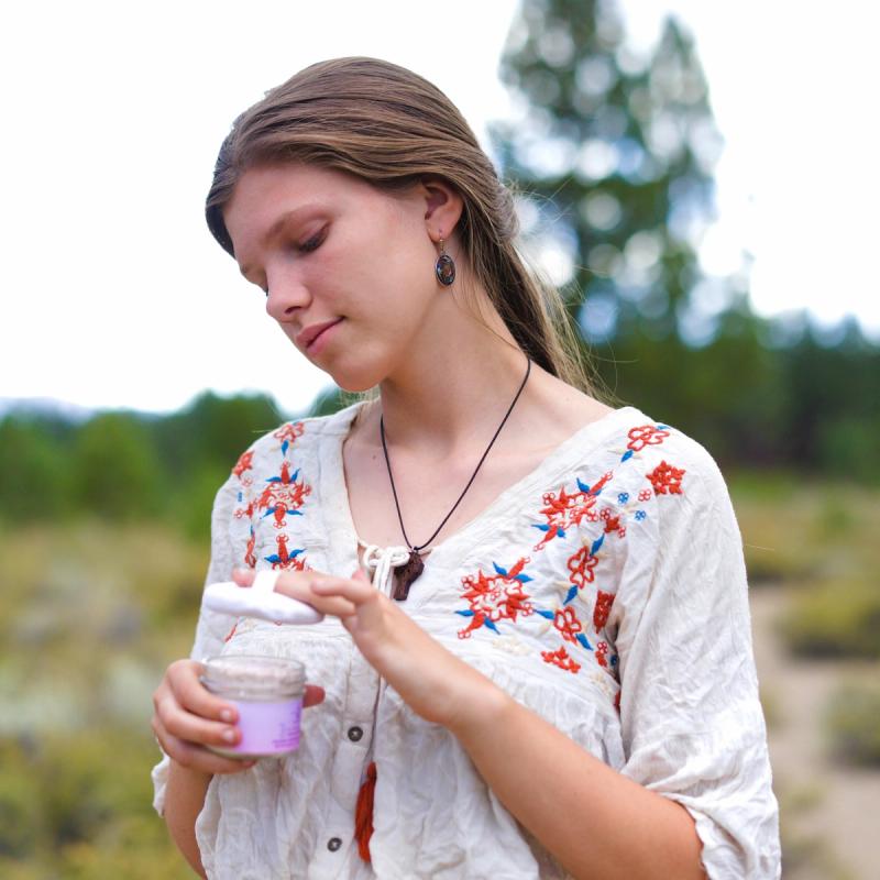 Herbalist Evelyn Kelly holding The Royal Kellys Body Powder