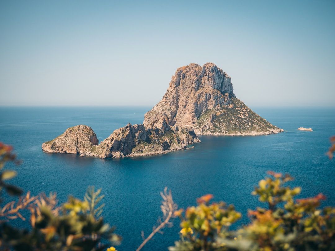 Es Vedra and Cala d'Hort - The Iconic Limestone Rock and Its Beach